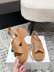PRADA 25S CRISSCROSS SANDALS IN BURNT ORANGE CALFSKIN LOGO