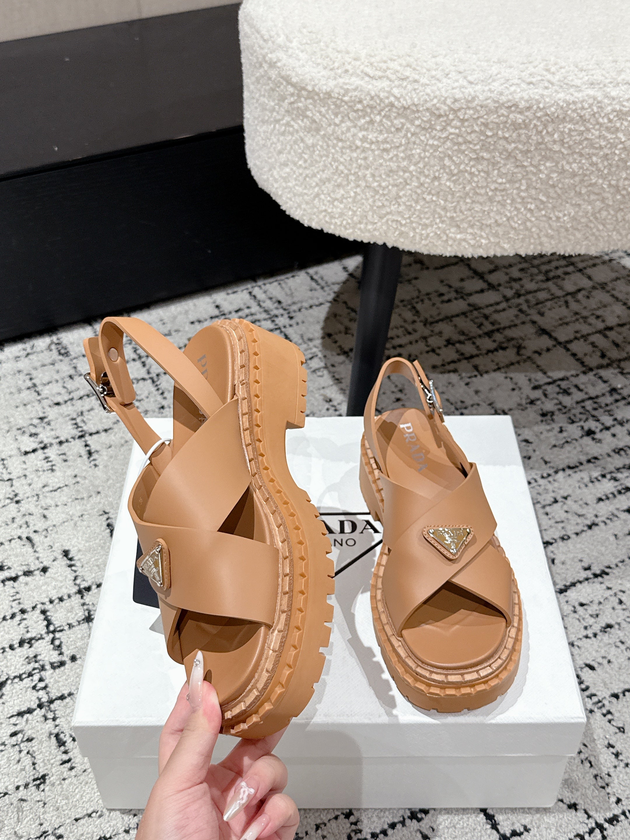 PRADA 25S CRISSCROSS SANDALS IN BURNT ORANGE CALFSKIN LOGO