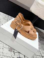PRADA 25S CRISSCROSS SANDALS IN BURNT ORANGE CALFSKIN LOGO