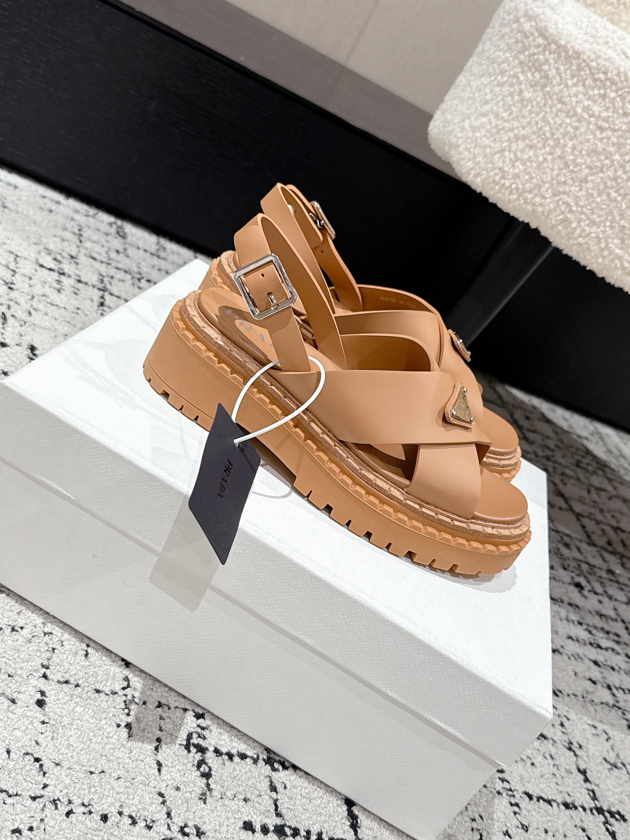 PRADA 25S CRISSCROSS SANDALS IN BURNT ORANGE CALFSKIN LOGO