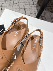 PRADA 25S CRISSCROSS SANDALS IN BURNT ORANGE CALFSKIN LOGO