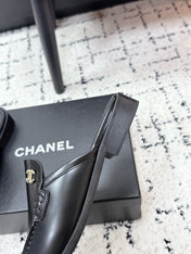 CHANEL 26S MULE LOAFERS IN BLACK SMOOTH CALFSKIN WITH CC LOGO