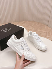 PRADA 25S DOWNTOWN SNEAKERS IN WHITE CALFSKIN SILVER HARDWARE