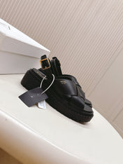 PRADA 25S CRISSCROSS SANDALS IN BLACK CALFSKIN