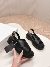 PRADA 25S CRISSCROSS SANDALS IN BLACK CALFSKIN