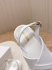 PRADA 25S CRISSCROSS SANDALS IN WHITE CALFSKIN