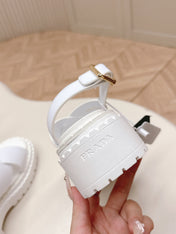 PRADA 25S CRISSCROSS SANDALS IN WHITE CALFSKIN