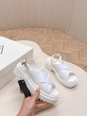 PRADA 25S CRISSCROSS SANDALS IN WHITE CALFSKIN