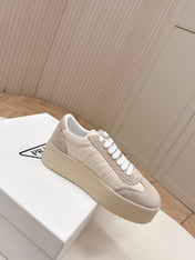 PRADA 26S PLATFORM SNEAKERS 50MM IN CREAM WHITE NYLON AND SUEDE