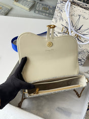 DIOR 25S MEDIUM SADDLE POUCH WITH CHAIN 21 IN LIGHT BLUE DIOR OBLIQUE JACQUARD CANVAS