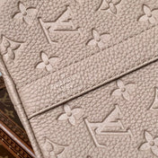 KEEPALL BANDOULIÈRE 34 BAG IN LIGHT BROWN MONOGRAM TAURILLON CALFSKIN