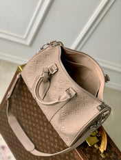 KEEPALL BANDOULIÈRE 34 BAG IN LIGHT BROWN MONOGRAM TAURILLON CALFSKIN
