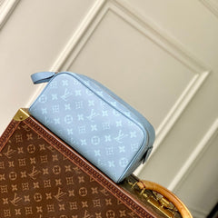 DOPP KIT 28 IN BLUE MONOGRAM COATED CANVAS