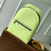 DISCOVERY SLIM BACKPACK 38 IN LEMON YELLOW MONOGRAM ECLIPSE REVERSE CALFSKIN