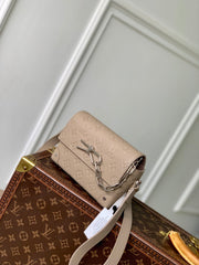 STEAMER WEARABLE WALLET 18 IN LIGHT BROWN MONOGRAM TAURILLON CALFSKIN