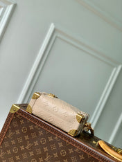 SIDE TRUNK 19 IN BEIGE MONOGRAM BOLD CALFSKIN GOLD HARDWARE