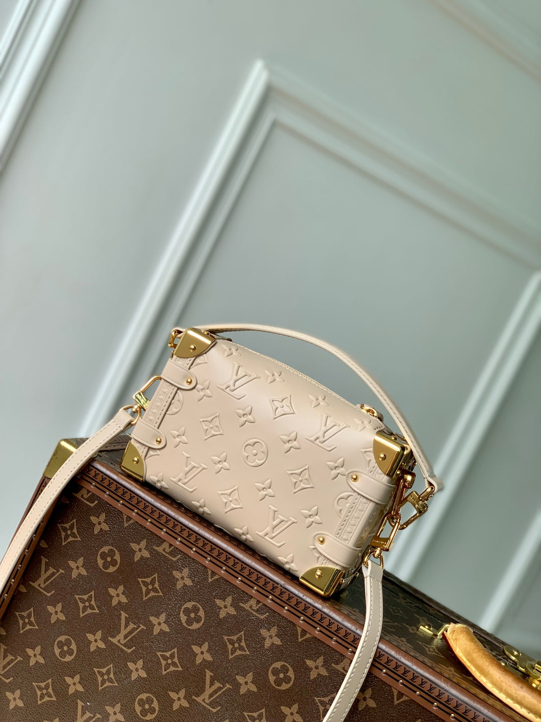 SIDE TRUNK 19 IN BEIGE MONOGRAM BOLD CALFSKIN GOLD HARDWARE