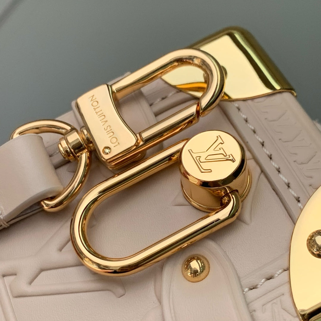 SIDE TRUNK 19 IN BEIGE MONOGRAM BOLD CALFSKIN GOLD HARDWARE