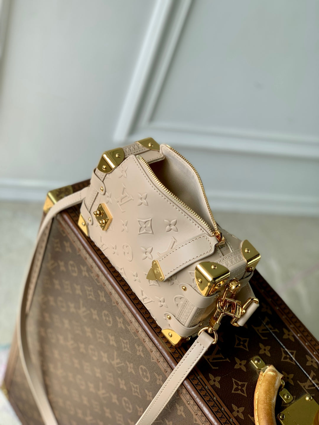 SIDE TRUNK 19 IN BEIGE MONOGRAM BOLD CALFSKIN GOLD HARDWARE