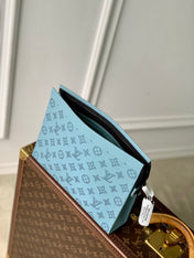 POCHETTE VOYAGE 26 IN SKY BLUE MONOGRAM ECLIPSE CALFSKIN