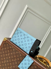 GASTON WEARABLE WALLET 22 IN SKY BLUE MONOGRAM SHADOW CALFSKIN EMBOSSED LOGO