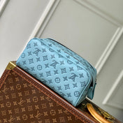 DOPP KIT 28 IN SKY BLUE MONOGRAM SHADOW CALFSKIN EMBOSSED LOGO