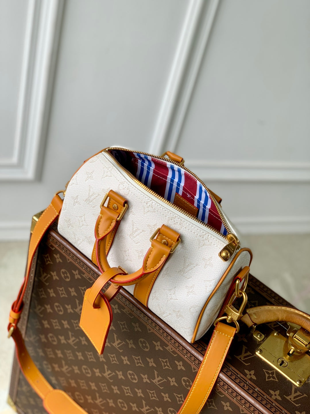 KEEPALL BANDOULIÈRE 25 IN WHITE MONOGRAM HERITAGE CANVAS BRWON CALFSKIN