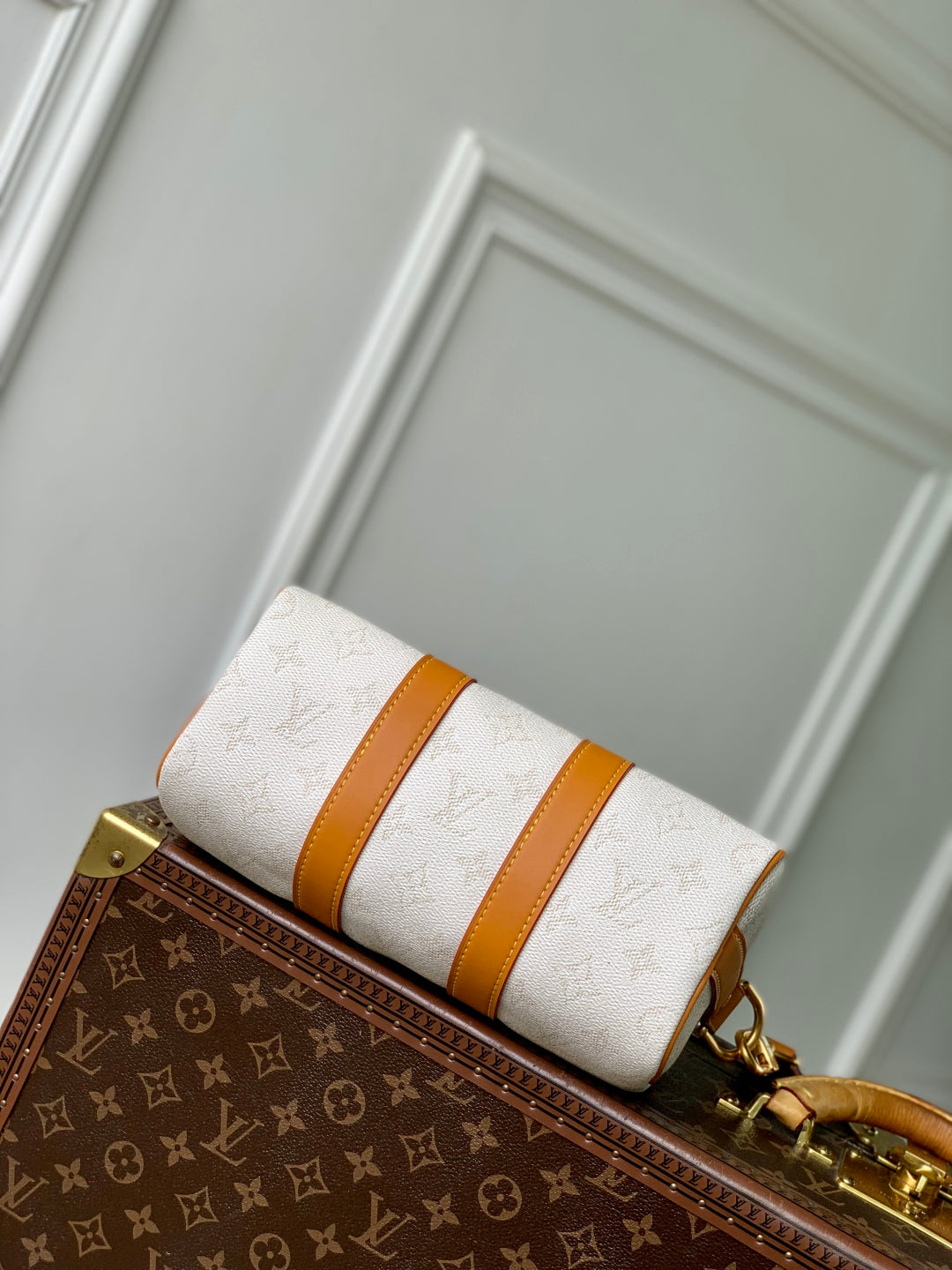 KEEPALL BANDOULIÈRE 25 IN WHITE MONOGRAM HERITAGE CANVAS BRWON CALFSKIN