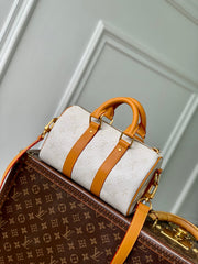 KEEPALL BANDOULIÈRE 25 IN WHITE MONOGRAM HERITAGE CANVAS BRWON CALFSKIN