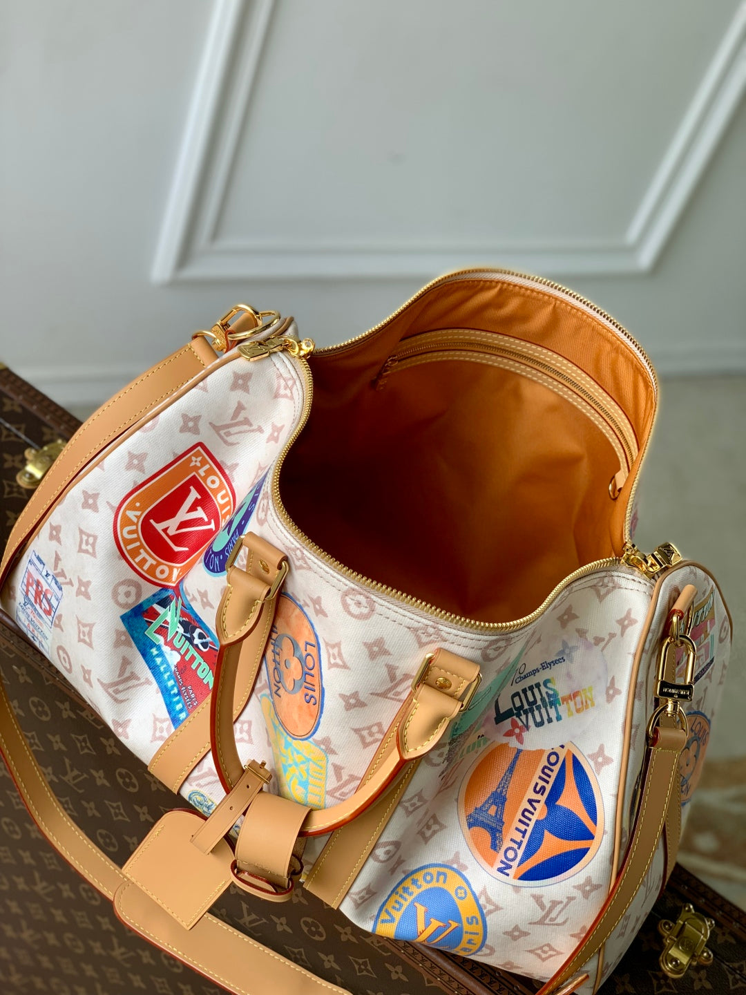 KEEPALL BANDOULIÈRE 45 IN WHITE MONOGRAM DUNE CANVAS AND CALFSKIN