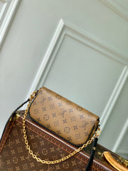 WALLET ON CHAIN IVY 23 IN BROWN MONOGRAM REVERSE CANVAS