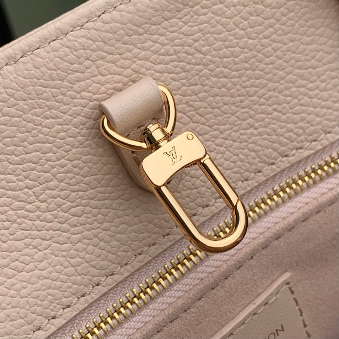 ONTHEGO MM 35 IN  BLUSH PINK MONOGRAM CALFSKIN
