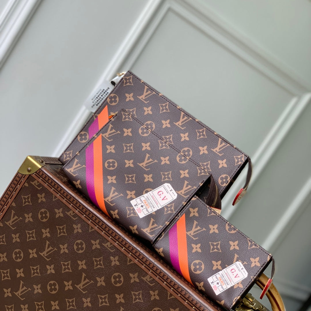 RIO TOILET POUCH 25 IN BROWN CANVAS MONOGRAM GOLD LOCK