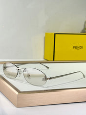 FIRST CRYSTAL RIMLESS OVAL FRAME SUNGLASSES FE4075US IN METAL