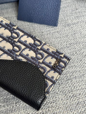 VERTICAL BIFOLD WALLET 19 IN BLACK GRAINED CALFSKIN MIX BLUE MONOGRAM OBLIQUE JACQUARD