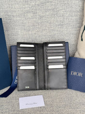 VERTICAL BIFOLD WALLET 19 IN BLACK GRAINED CALFSKIN MIX BLUE MONOGRAM OBLIQUE JACQUARD