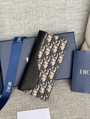 VERTICAL BIFOLD WALLET 19 IN BLACK GRAINED CALFSKIN MIX BLUE MONOGRAM OBLIQUE JACQUARD