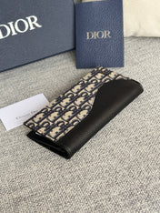 VERTICAL BIFOLD WALLET 19 IN BLACK GRAINED CALFSKIN MIX BLUE MONOGRAM OBLIQUE JACQUARD