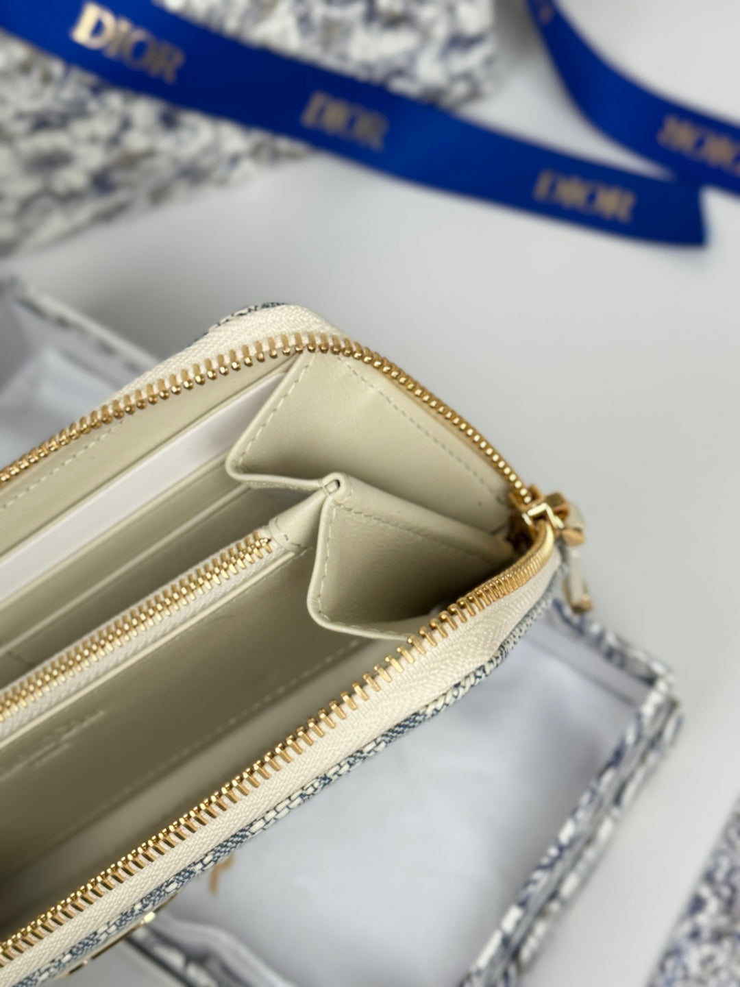 DIOR 25S LONG ZIPPER WALLET 19 IN LIGHT BLUE OBLIQUE JACQUARD CANVAS