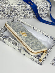 DIOR 25S LONG ZIPPER WALLET 19 IN LIGHT BLUE OBLIQUE JACQUARD CANVAS