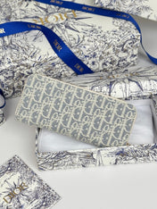 DIOR 25S LONG ZIPPER WALLET 19 IN LIGHT BLUE OBLIQUE JACQUARD CANVAS