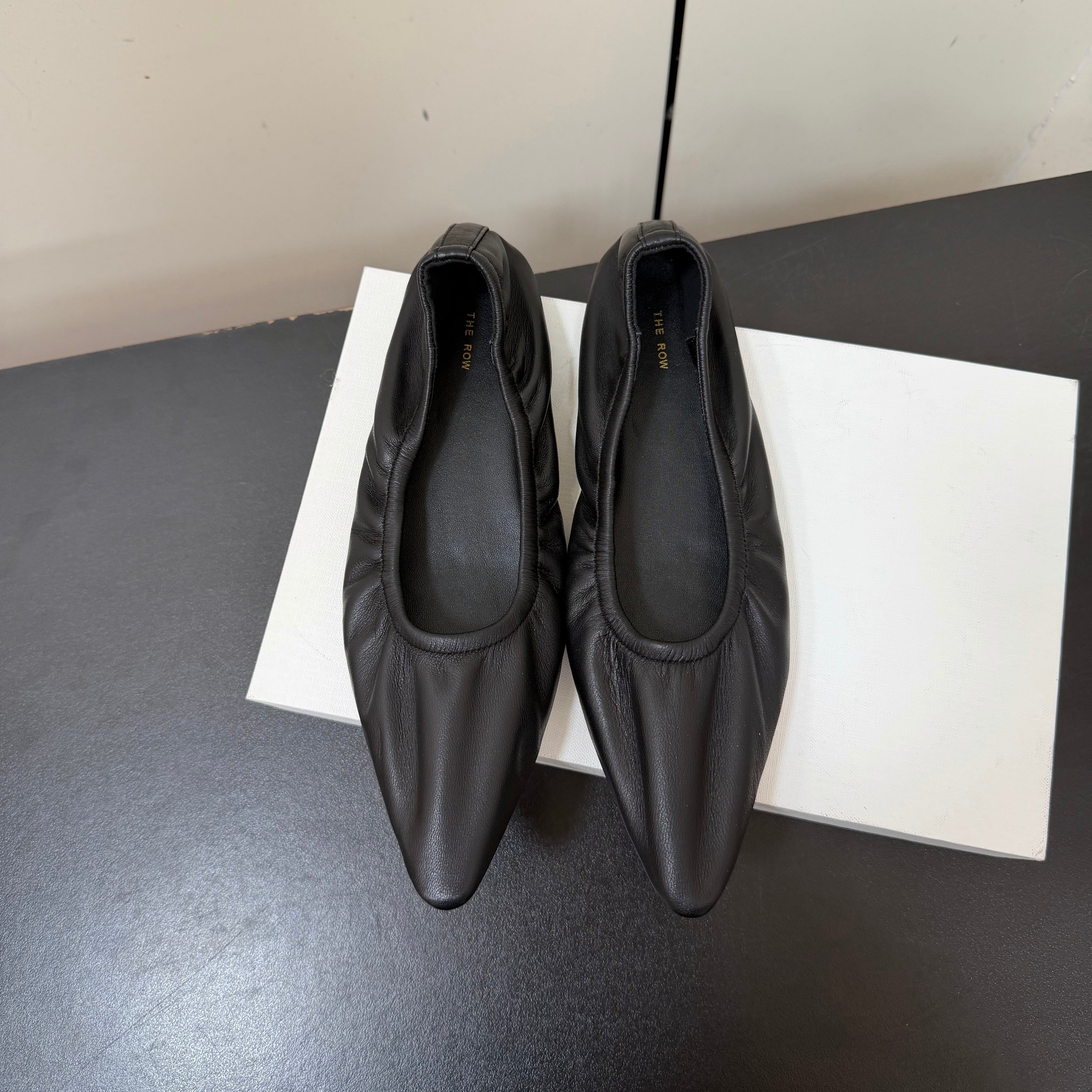 THE ROW 26S POINTED TOE BALLET FLATS IN BLACK LAMBSKIN