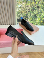 MIUMIU 26S LOAFERS IN BLACK LAMBSKIN