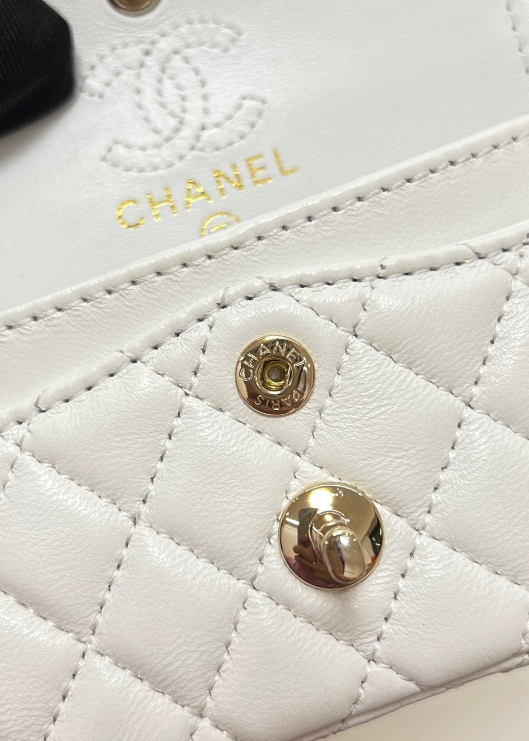 CHANEL 25S FLAP CHARM BAG 13 IN WHITE LAMBSKIN