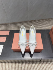 MIUMIU 26S POINTED TOE PUMPS 55MM IN WHITE CALFSKIN WITH BOW