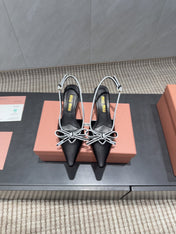 MIUMIU 26S SLINGBACK 55MM IN BLACK AND WHITE CALFSKIN WITH BOW