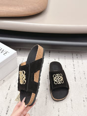 LOEWE 26S FLAT SANDALS IN BLACK LOGO GOLD HARDWARE