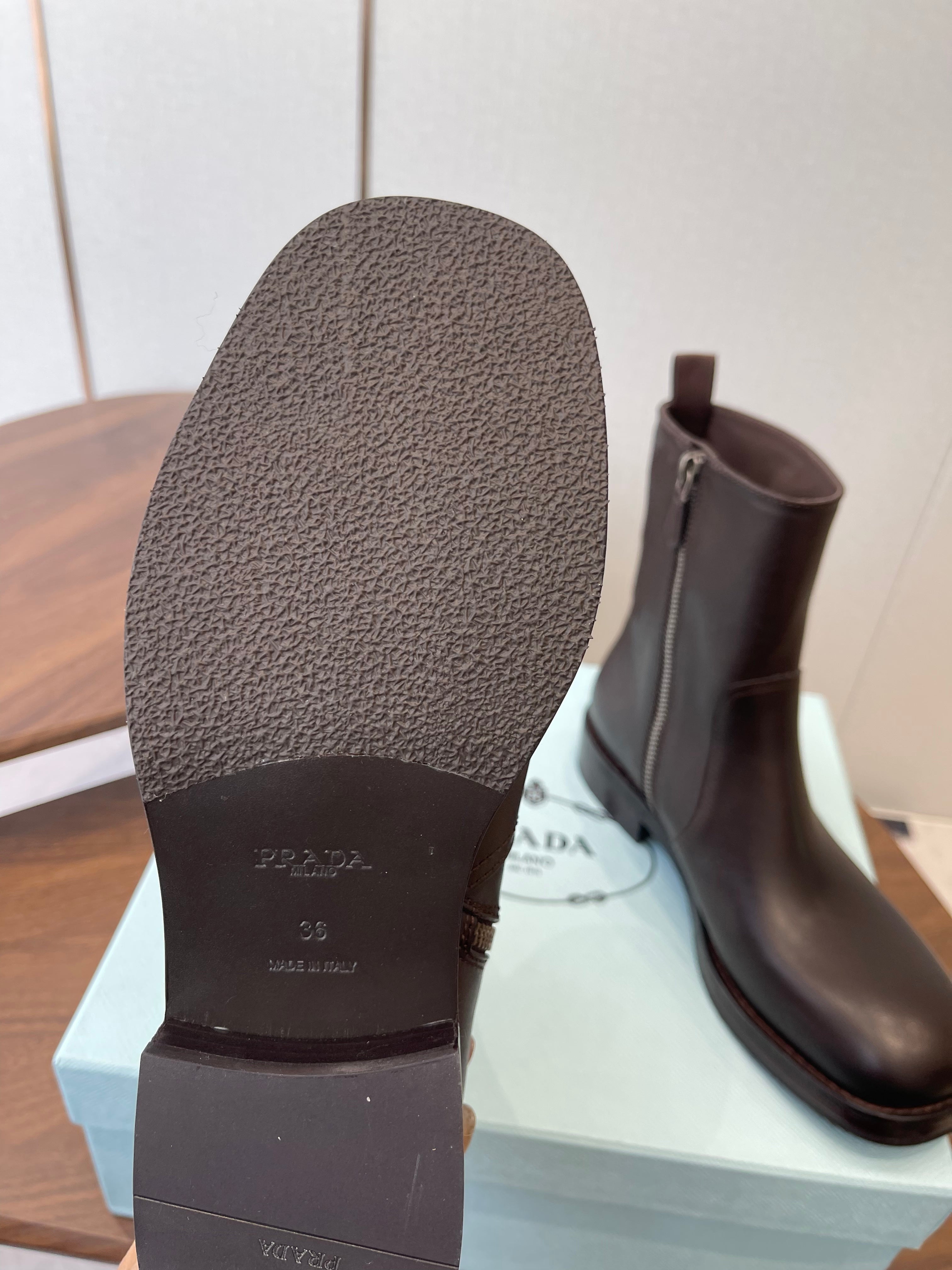 PRADA 25S COWBOY BOOTS IN DARK BROWN CALFSKIN