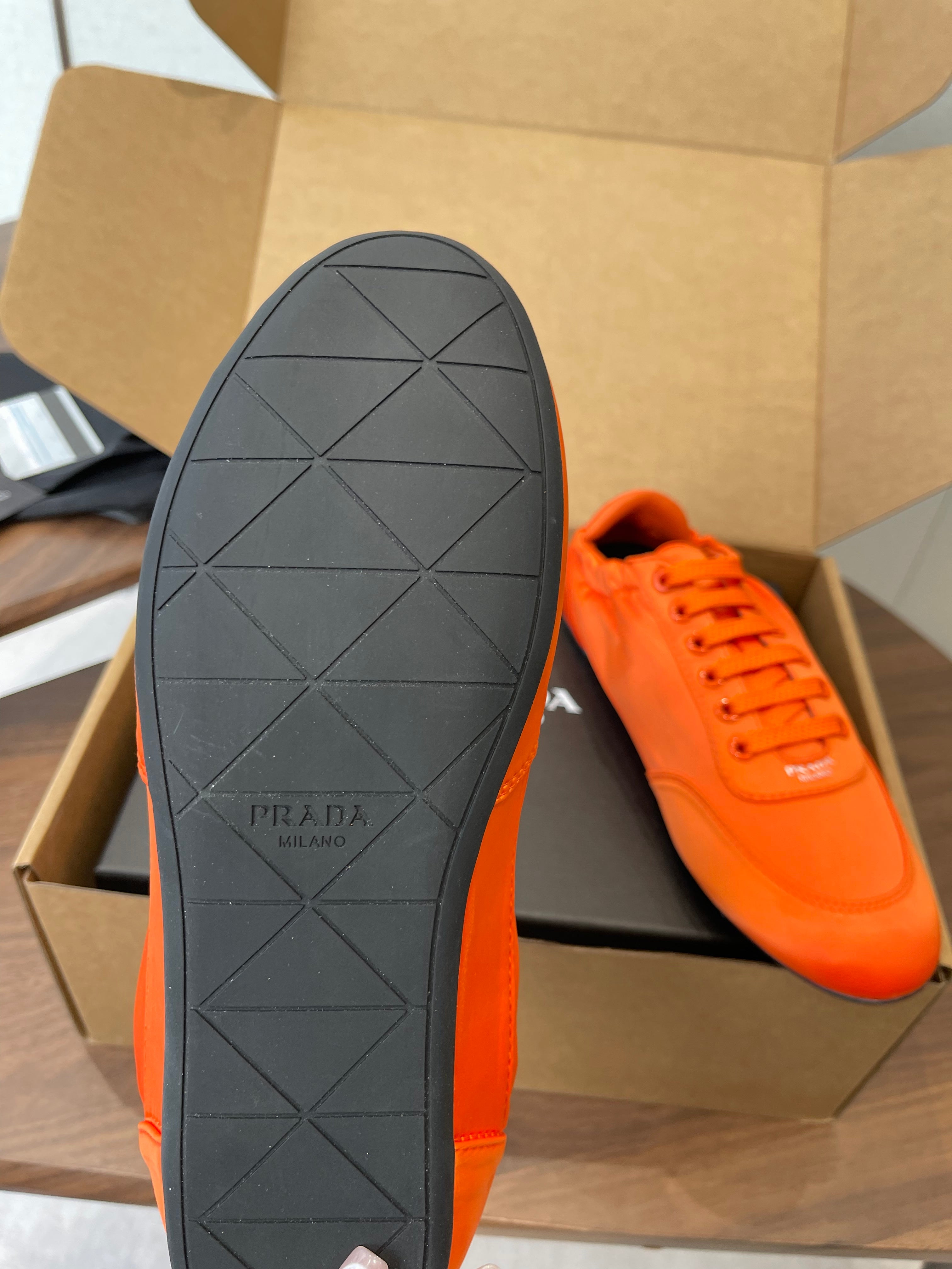 PRADA 25S SNEAKER IN ORANGE SILK