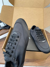 PRADA 25S SNEAKER IN BLACK SILK